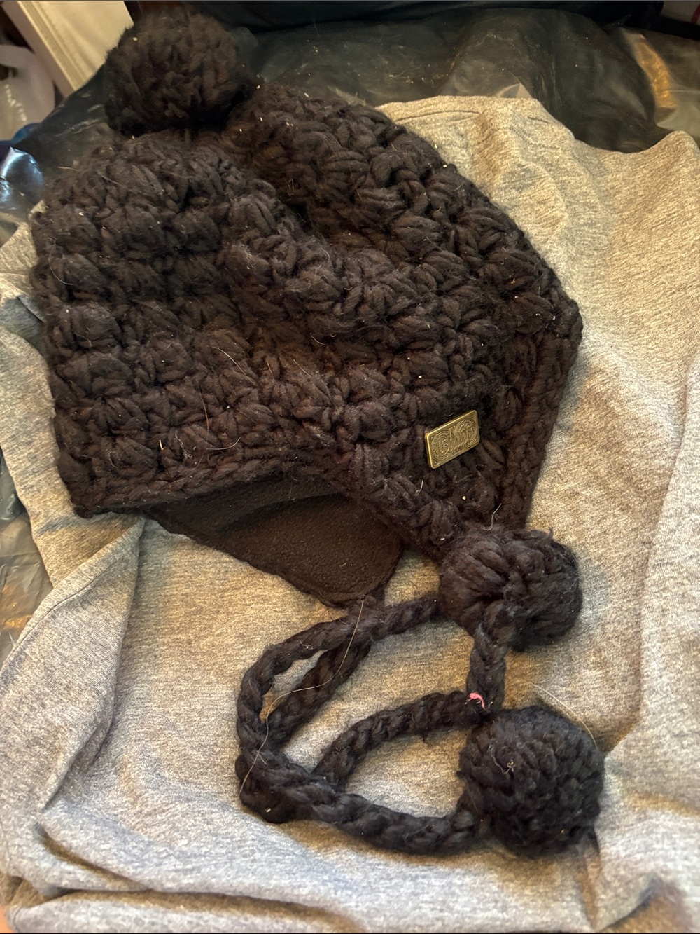 Chaos Fleece Lined Black Knit Pom-Pom Earflap Hat